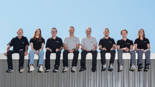 Käser Druck AG – Team auf dem Dach